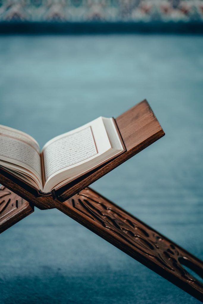 Quran on Wooden Shelf in Mosque